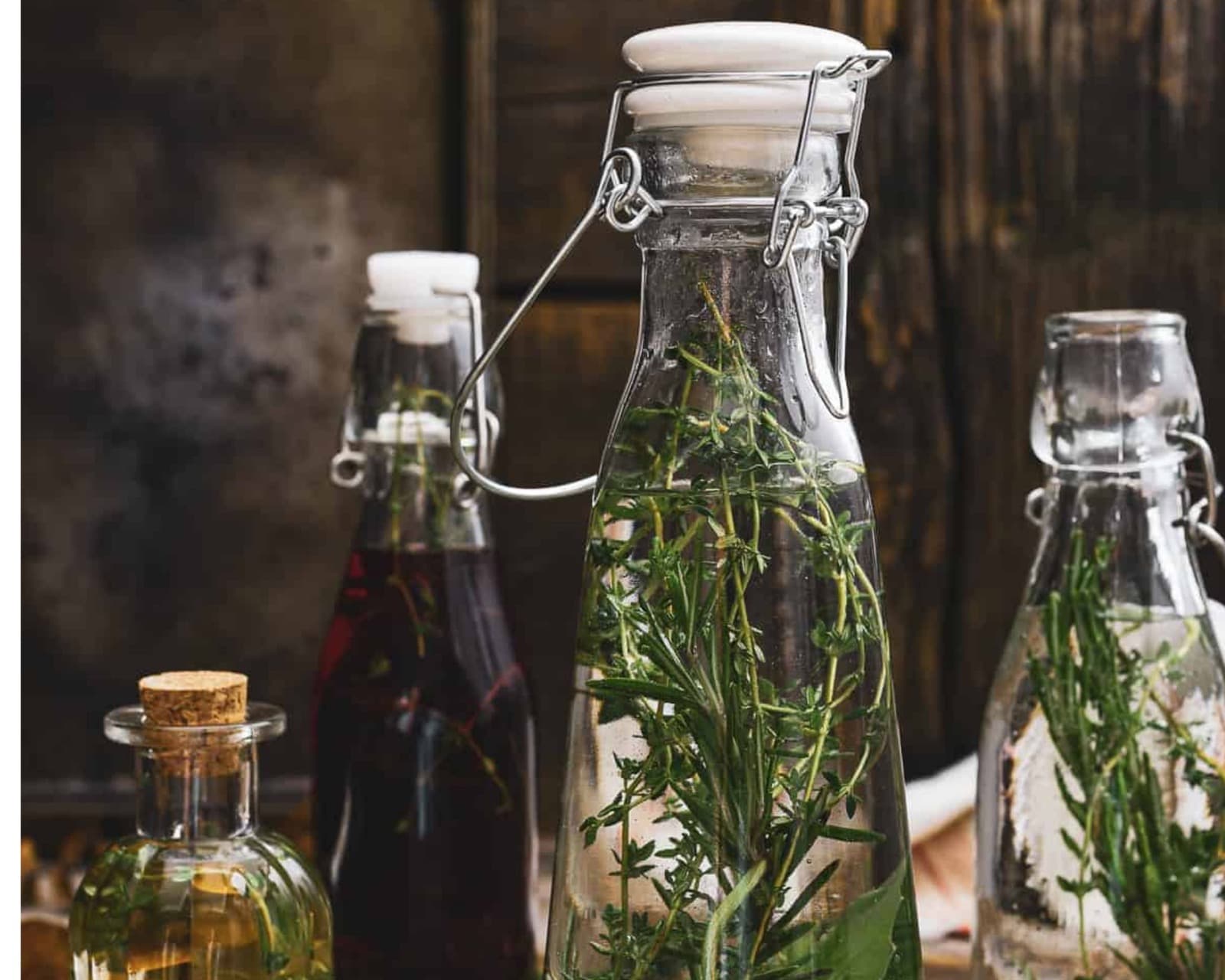 Herb-infused vinegar in a clear bottle or jar.